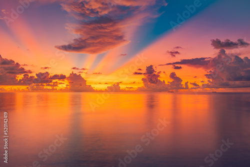 Beautiful sunset sea ocean. Vibrant and soft colors, magic light. Fantastic clouds sky, reflection on water. Concept of romantic time on vacation in tropical. Positive energy, meditation inspiration © icemanphotos