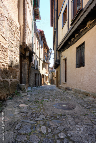 Fototapeta Naklejka Na Ścianę i Meble -  Narrow cobbled streets of, La Alberca, a small town in Spain. It was the first Spanish town declared a Historic-Artistic Site, in 1940.