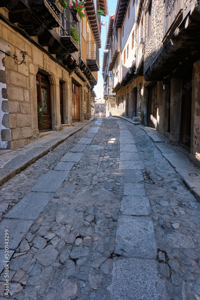 Narrow cobbled streets of, La Alberca, a small town in Spain. It was the first Spanish town declared a Historic-Artistic Site, in 1940. Narrow cobbled streets of, La Alberca, a small town in Spain. It was the first Spanish town declared a Historic-Artistic Site, in 1940.