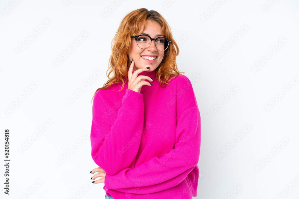 Young caucasian woman isolated on white background thinking an idea while looking up Young caucasian woman isolated on white background thinking an idea while looking up