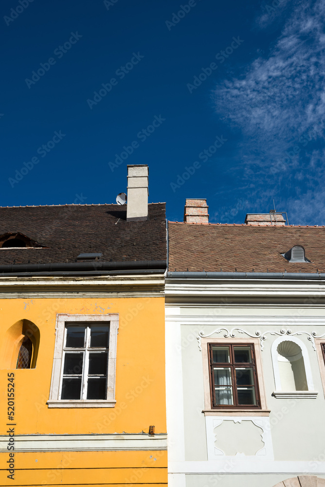Fototapeta premium Adjoined old houses facade detail