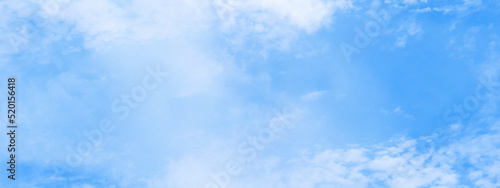 Clear and cloudy puffy and blurry blue sky background, bright and fresh blue sky and white clouds of summer or winter seasons.