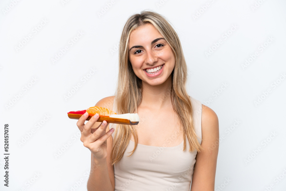 Young caucasian woman holding sashimi isolated on white background smiling a lot Young caucasian woman holding sashimi isolated on white background smiling a lot