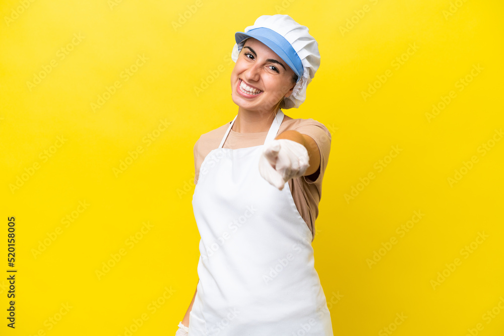 Fishwife woman over isolated background pointing front with happy expression Fishwife woman over isolated background pointing front with happy expression