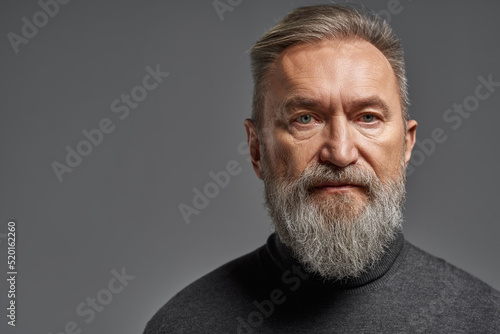 Portrait of senior caucasian man looking at camera