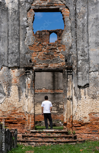 Adult Woman Taking Photo of Wichayen House While Travel to Lopburi Thailand photo