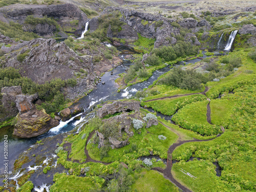 Drone view at the waterfalls of Gjain in Iceland