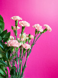 Bouquet of small decorative roses on a colored background. Greeting card with a bouquet of flowers