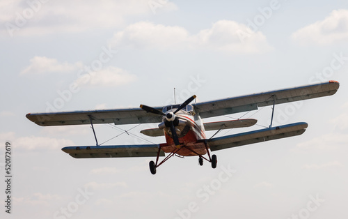 Fototapeta Naklejka Na Ścianę i Meble -  light aircraft returning to land after dropping