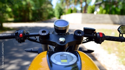 Handlebars and speedometer of motorbike