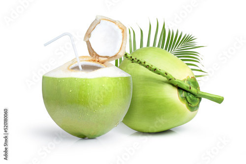 Fresh green coconut water with straw isolated on white background. photo