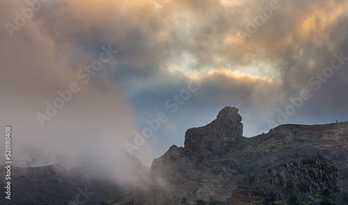 Wild volcanic mountain ridge against overcast sky on the isle of La Gomera  Spain