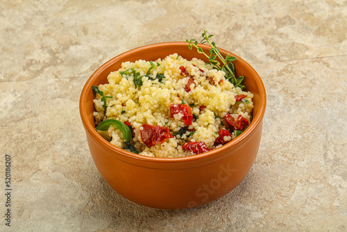 Vegetarian uisine - couscous with vegetables photo