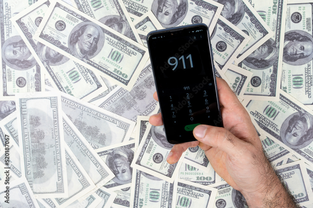 Man calling 911 on the phone Man calling 911 on the phone