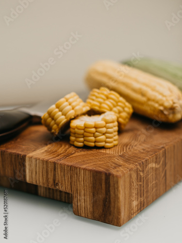 corn on a wooden cutting board table