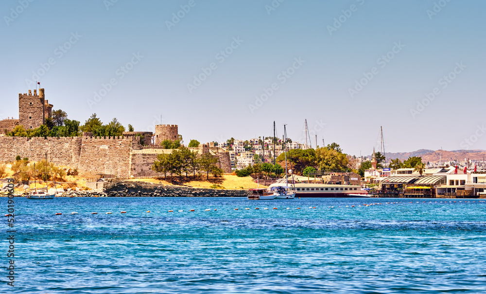 Bodrum, Turkey, Aegean Sea, view of a city, an embankment with restaurants and the old castle of St. Peter.