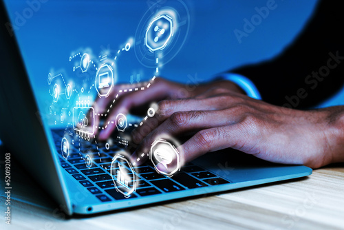 Cloud Computing. business man using laptop computer with virtual graphic icon on desk at home, document management, data management system, business finance, internet network technology concept