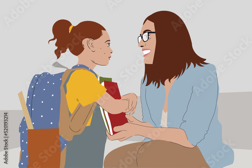 First day at school. Kid with parent on first day at school. Mother brings her daughter to school. Woman and girl with backpack and books. Beginning of lessons. Back to school. First day of fall 