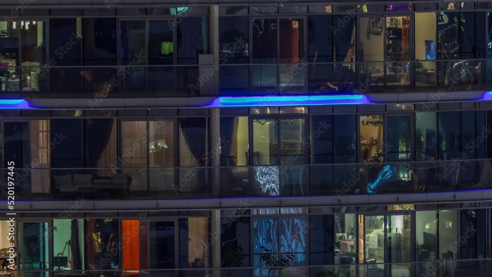 Windows of apartment buildings at night timelapse, the light from the panoramic windows of houses. Evening landscape of the city with glowing rooms Windows of apartment buildings at night timelapse, the light from the panoramic windows of houses. Evening landscape of the city with glowing rooms