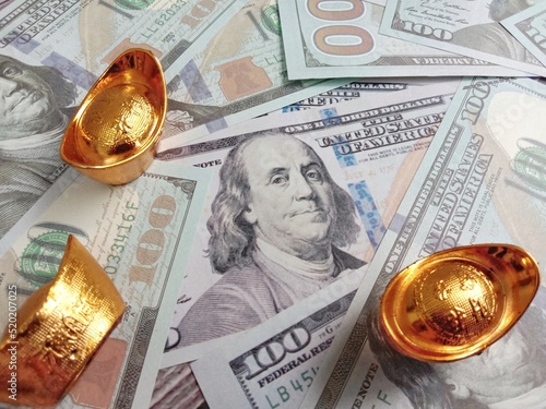 Selective focus of fake money, america dollar, and gold , recession, improvement concept , financial, 
