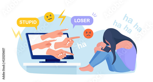 Cyber Bullying. Sad teenage girl sitting in front of computer with dislike in social media, mockery. Depressed young woman after insult, swear, verbal abuse in internet. Depression, stress concept