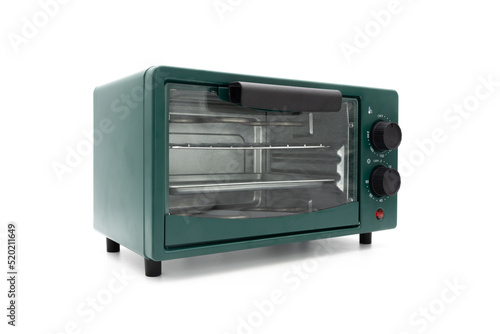 A green mini oven closeup isolated on white background