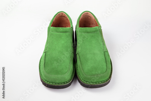 Male green leather shoe on white background, isolated product.