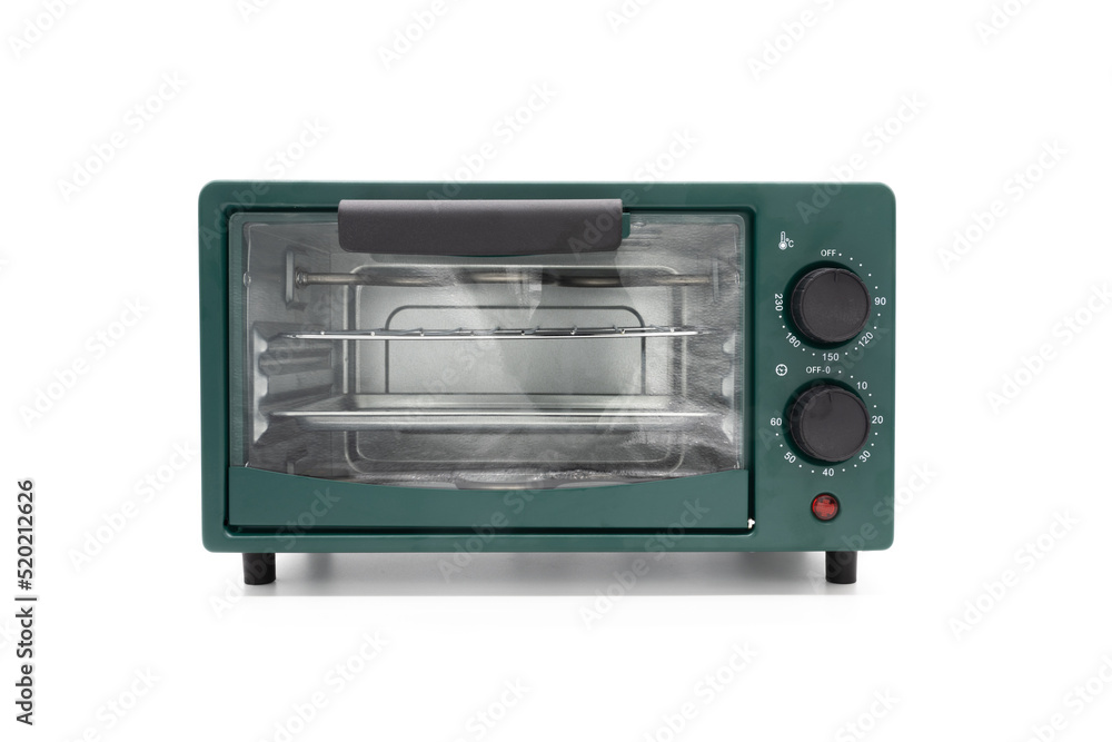 A green mini oven closeup isolated on white background A green mini oven closeup isolated on white background