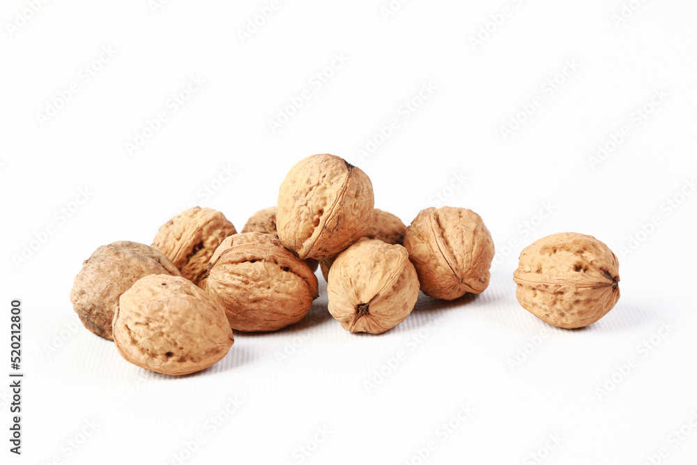 walnuts in the studio on a white background walnuts in the studio on a white background