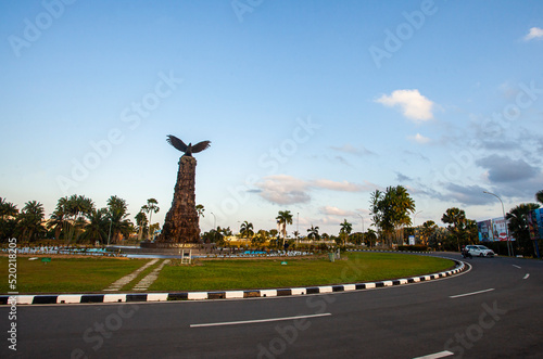 The eagle (garuda) monument in the middle of a roundabout near Hang Nadim Airport. This monument is one of the landmarks and icons of the city of Batam, Riau Islands. photo