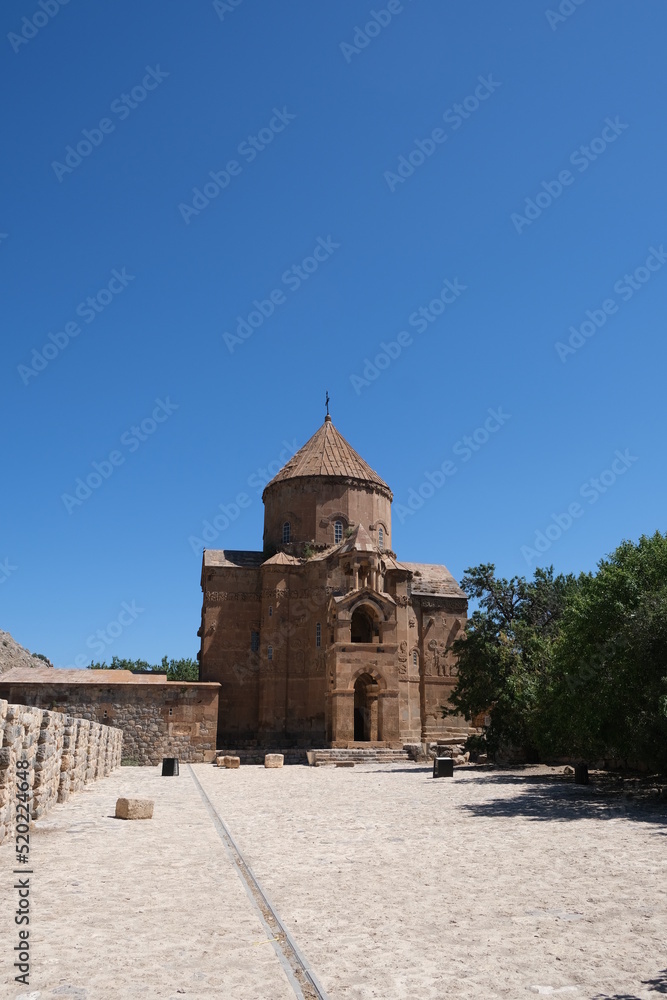 Akdamar Church (the Church of the Holy Cross) is located on Ahtamar Island in Lake Van within borders of Gevaş District of Province of Van. Selective focus of Akdamar Church. Copy space area.