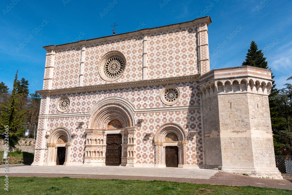 Fototapeta premium Beautiful Romanesque portal of the basilica Santa Maria di Collemaggio in L'Aquila, Italy