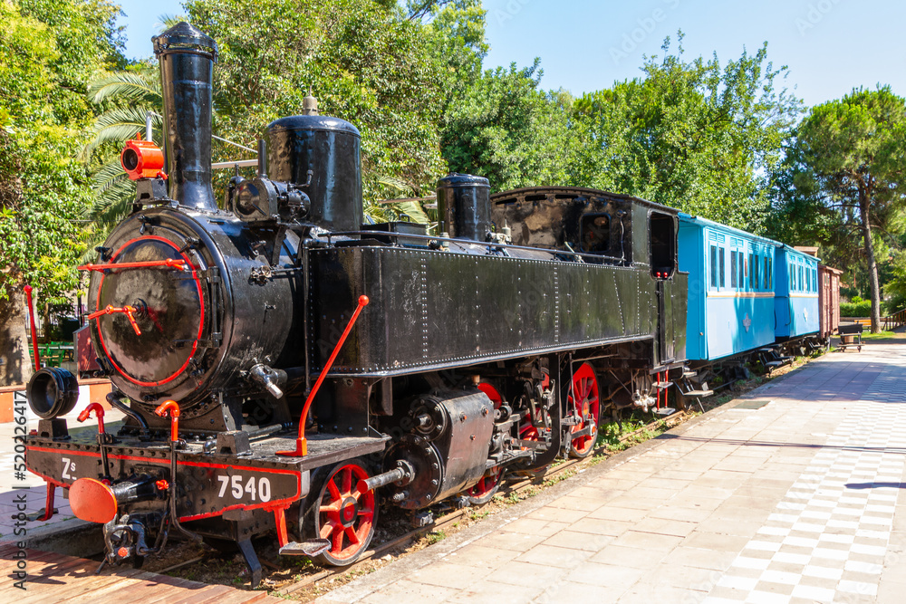 Kalamata, Greece, July 21, 2022. Old train in the Municipal Railway Park of Kalamata. Kalamata, Greece, July 21, 2022. Old train in the Municipal Railway Park of Kalamata.