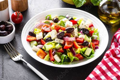 Greek salad. Vegetable salad with tomato, cucumber, feta cheese and olive oil.