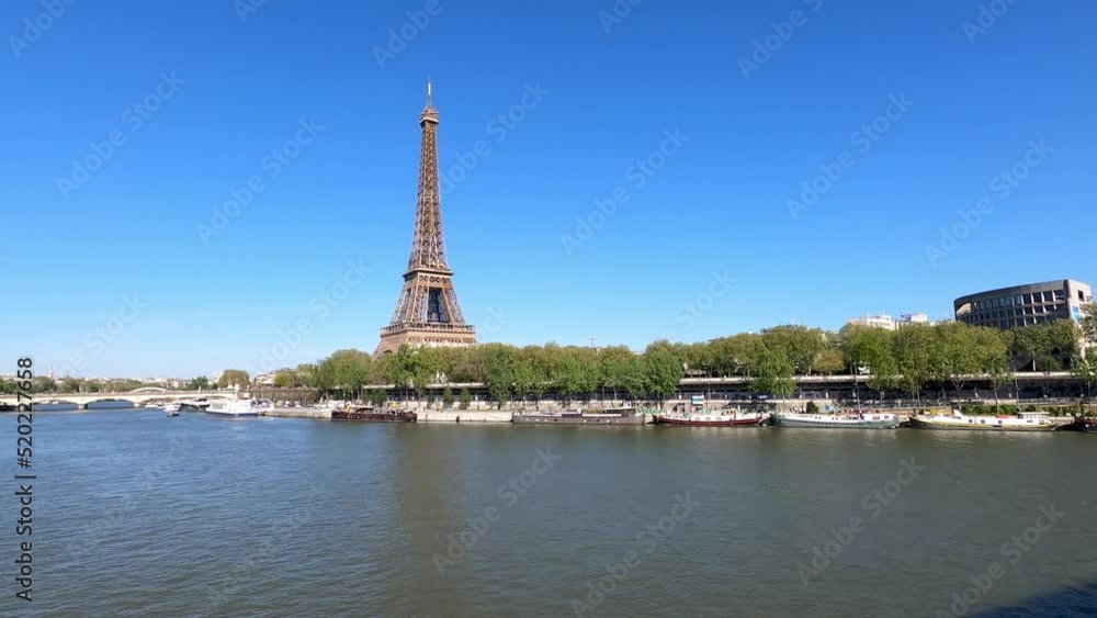 Eiffel Tower and Seine river in Paris in a sunny day Eiffel Tower and Seine river in Paris in a sunny day