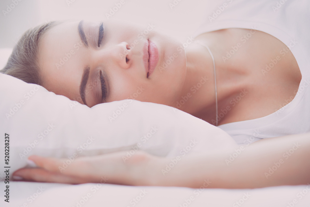 Beautiful young blonde woman sleeping in bed Beautiful young blonde woman sleeping in bed