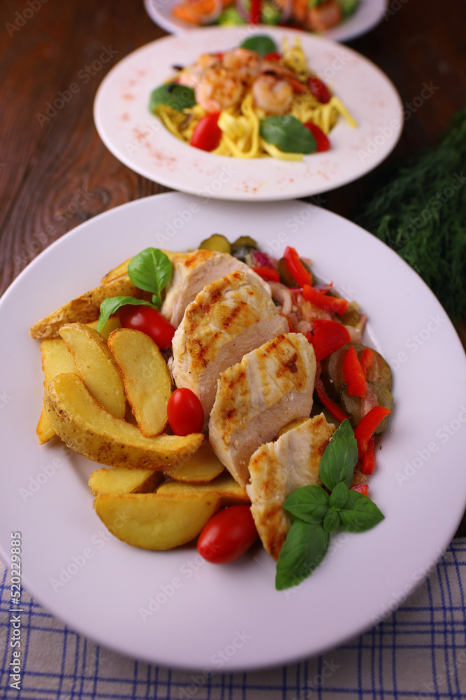 Delicious dinner set - poultry with potatoes and vegetables Delicious dinner set - poultry with potatoes and vegetables