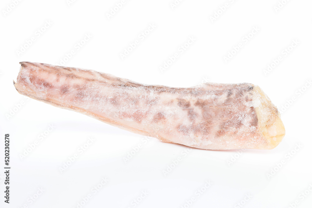 Frozen kingklip fish. Frozen red fish Frost on the surface of the fish. Ice. Rare and scarce fish. Frozen kingklip fish. Frozen red fish Frost on the surface of the fish. Ice. Rare and scarce fish.