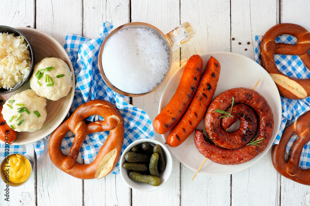 Traditional German Oktoberfest meal. Top view table scene over a white ...