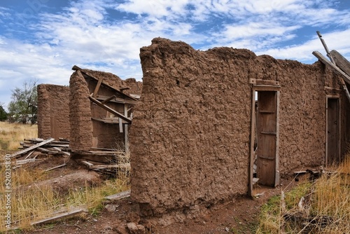 collapsed adobe house, made incorrectly
