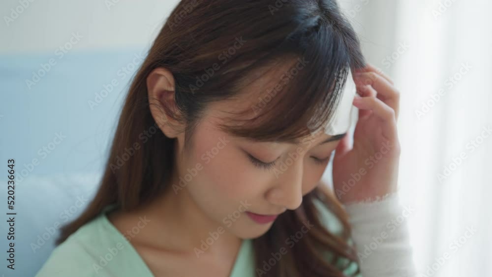 Close-up Shot, Female Patient with Stress Feeling. She felt pain in her Wound at Hospital. Healthcare, Lifestyle, Insurance Concept.