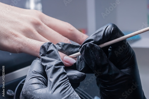 The process of manicure in a beauty salon close-up