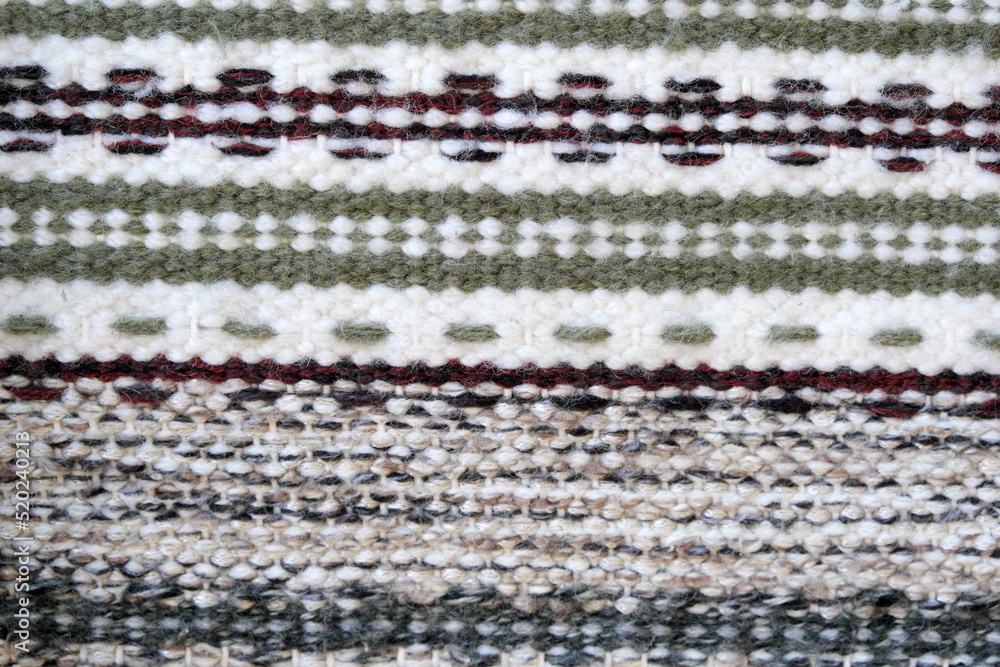 Fototapeta premium Fragments of hand-knitted floor rugs
