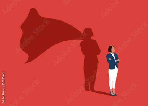 Businesswoman dreams of becoming a superhero. Confident handsome young woman standing superhero shadow concept illustration.