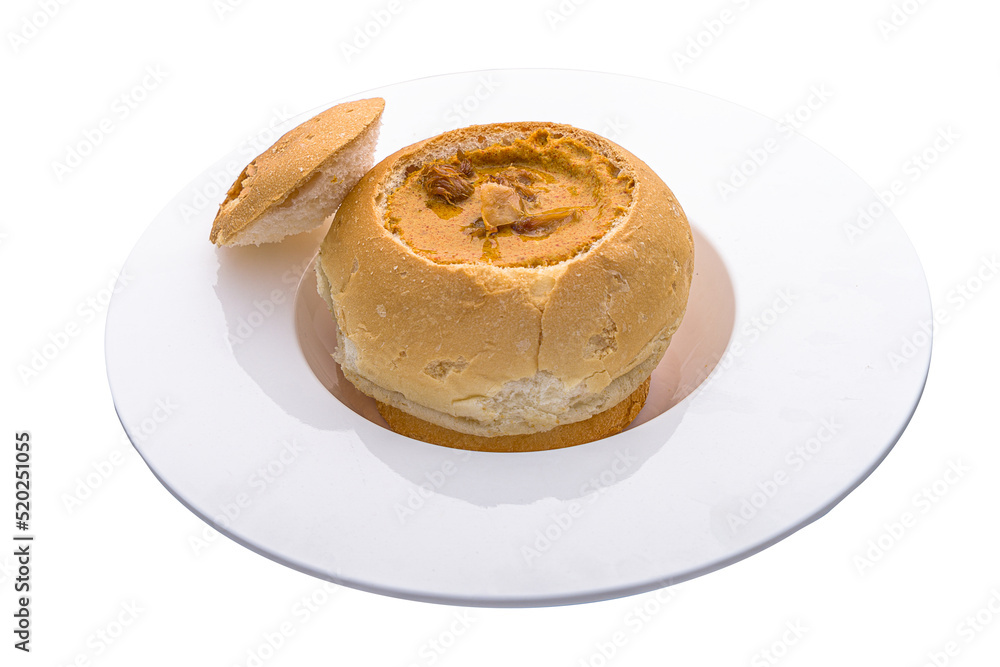 Nanyang Curry Lion Mane served in Bread Bowl isolated on white background side view Nanyang Curry Lion Mane served in Bread Bowl isolated on white background side view