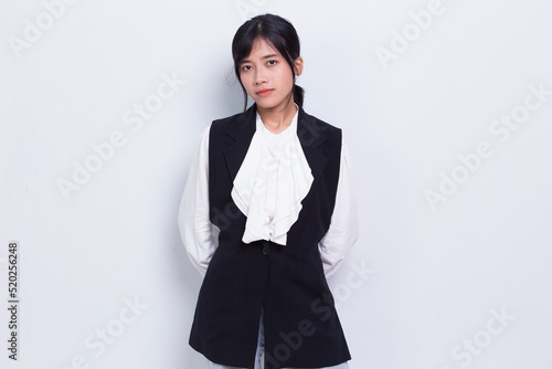 portrait of young asian business woman isolated on white background
