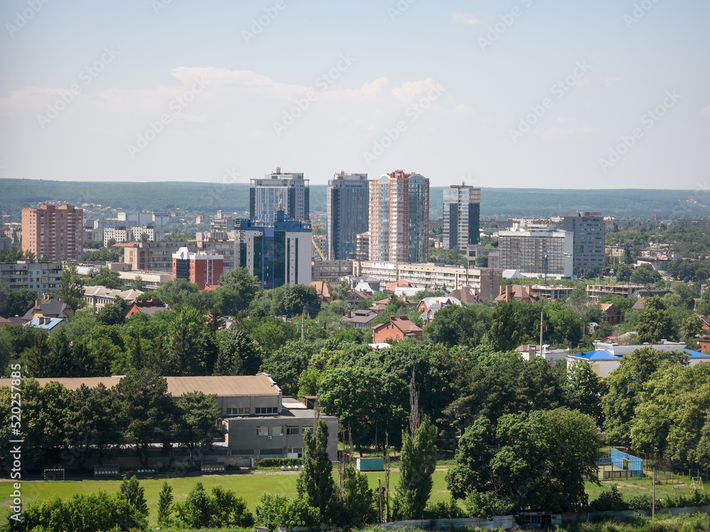 Cityscape of a part of the city with a stadium, on a sunny summer day. Ukraine, Kharkiv Cityscape of a part of the city with a stadium, on a sunny summer day. Ukraine, Kharkiv