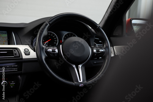Фотография Modern car steering wheel
