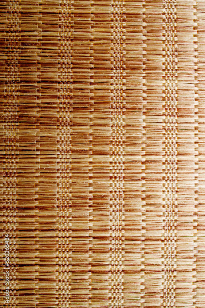 Wicker background made of natural straw. Full frame of densely woven straw pattern. Natural, natural background Wicker background made of natural straw. Full frame of densely woven straw pattern. Natural, natural background