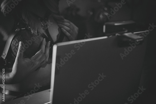 Seductive woman working as webcam bdsm model.